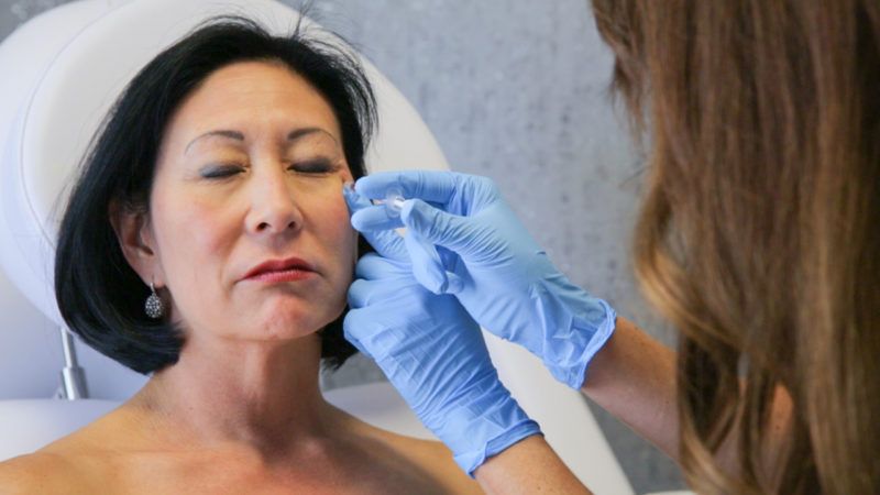 a woman gets a neuromodulator injection