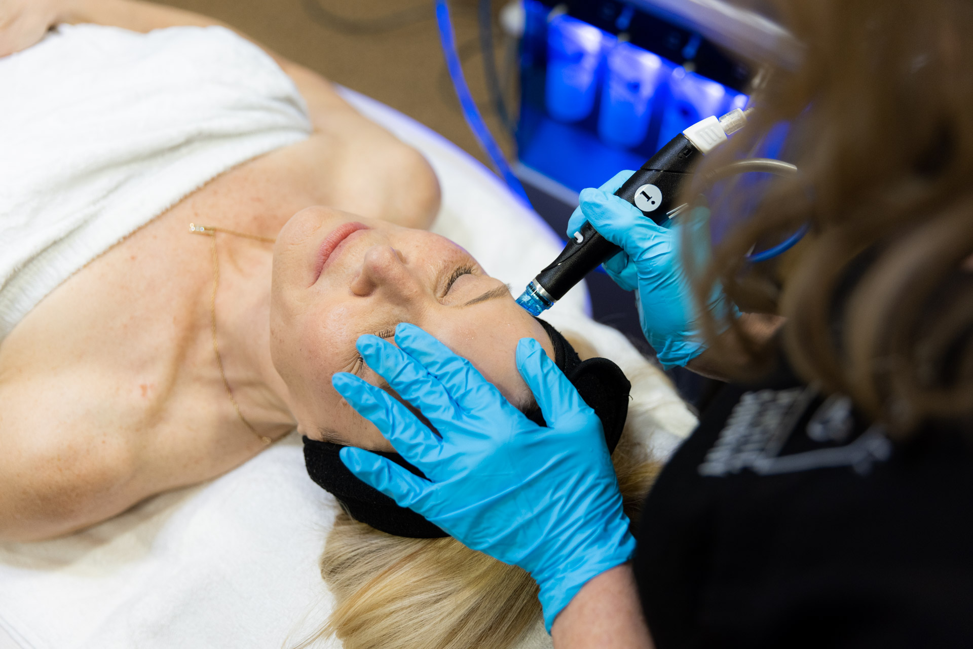 using gloves and a tool for a HydraFacial