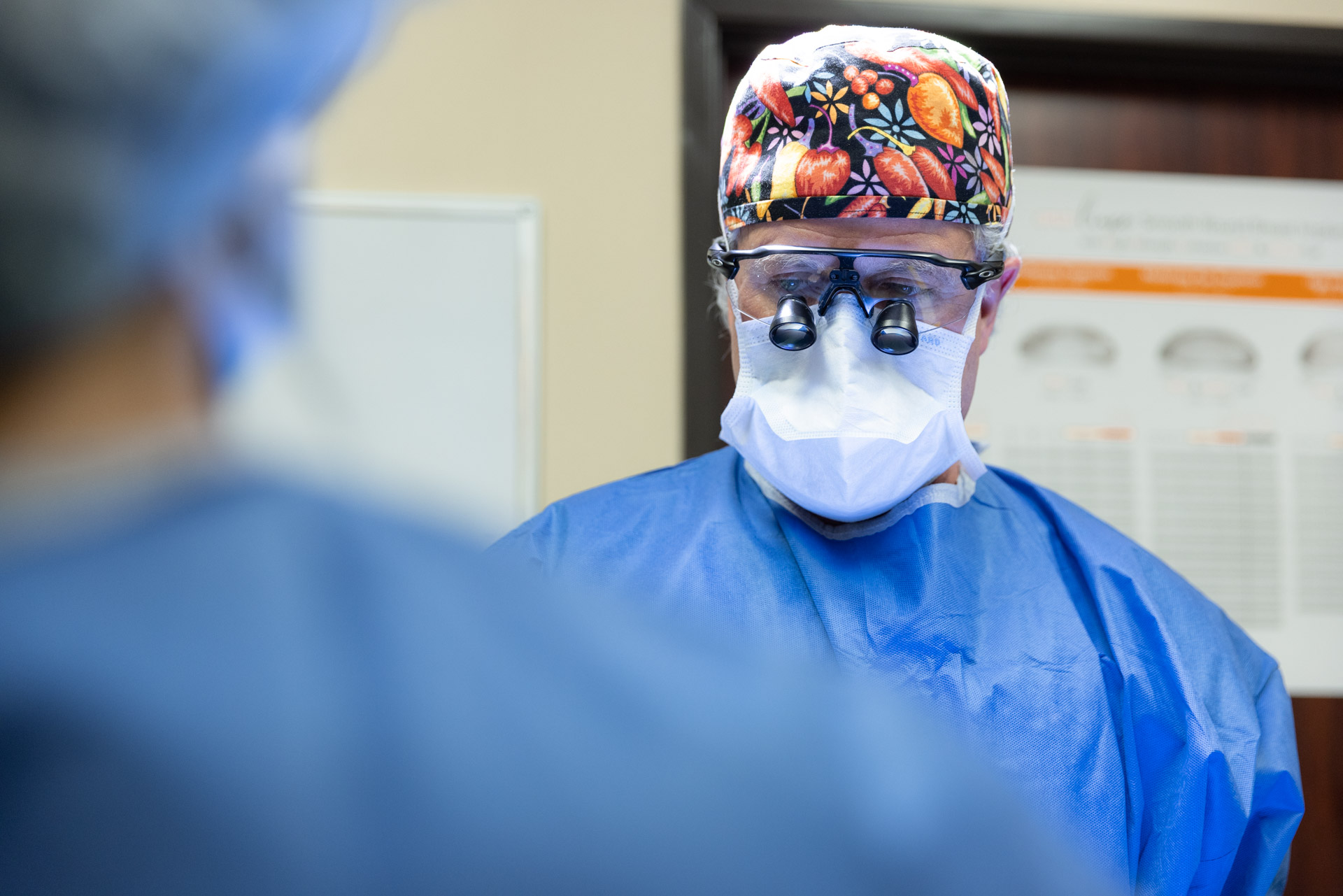 surgeon ready to operate with eyewear and mask