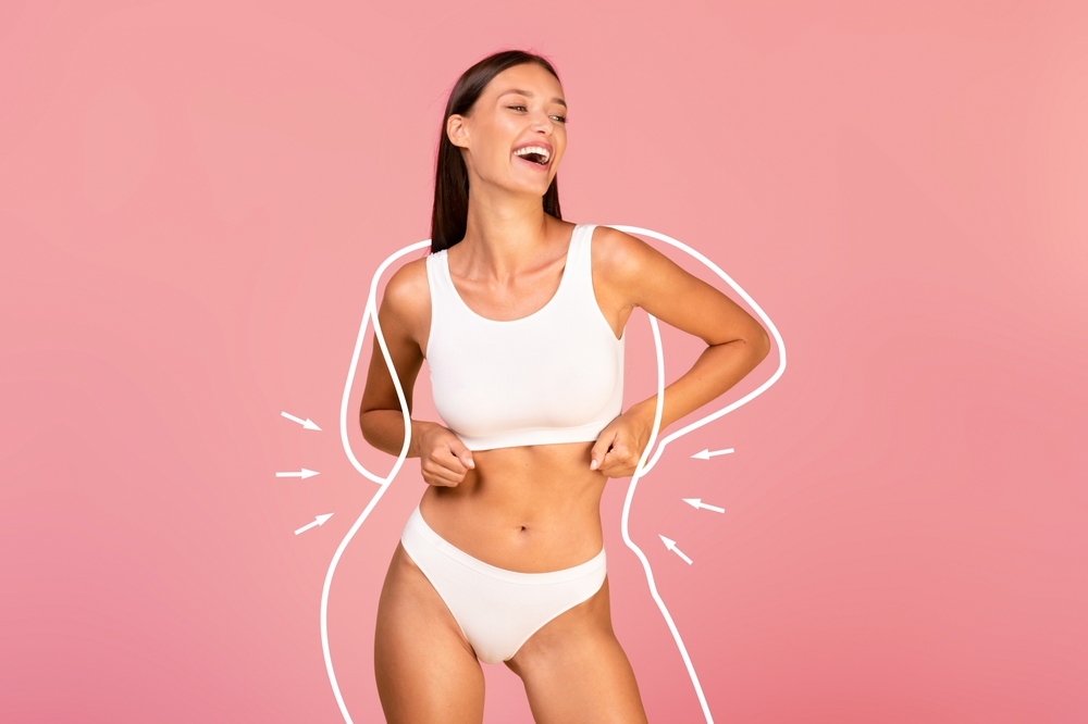 A woman posing in white underwear after liposuction in Southlake, TX